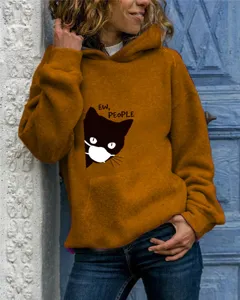 Detailed view of women casual mustard yellow hooded sweatshirt featuring cute cat graphic print.