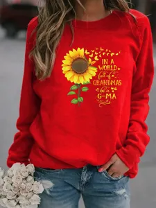 Sweat-shirt rouge à col rond avec graphique tournesol et design de texte familial doux.