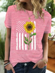 Women heather pink short sleeve t-shirt featuring sunflower and flag graphic design casual top.