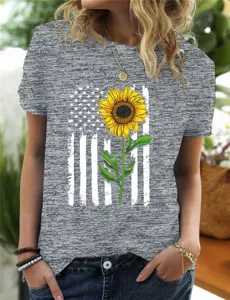 Heather gray short-sleeve t-shirt featuring American flag sunflower graphic print casual top.