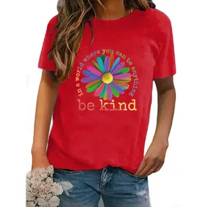 Women's red short sleeve t-shirt with colorful daisy and inspiring text print design.