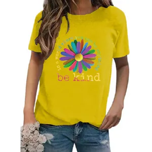 Detailed view of the yellow short sleeve t-shirt featuring a colorful daisy and inspiring text.