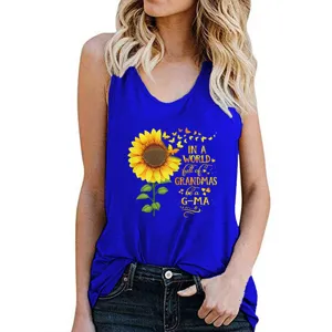 Detail view of royal blue women's sleeveless tank top with sunflower graphic print.