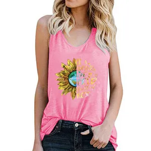 Close-up view of pink women tank top featuring creative sunflower graphic and text print.
