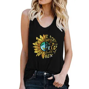 Women casual black racerback tank top featuring cute sunflower and earth graphic print.