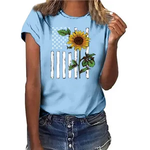 Close-up detail of women's light blue short sleeve t-shirt featuring sunflower flag graphic.