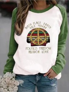 Felpa casual invernale in felpa con maniche raglan, grafica di pace e testo ispiratore.