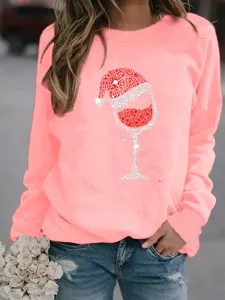 Casual long sleeve crewneck sweatshirt featuring a sparkling rhinestone Christmas wine glass graphic.