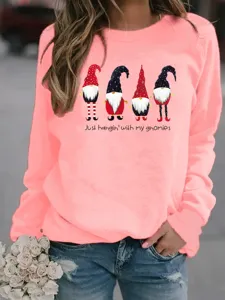 Detailed view of women's pink Christmas gnome print crewneck fleece sweatshirt casual top.