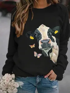 Zwarte casual longsleeve fleece sweater met schattige koe en vlinder graphic detail.