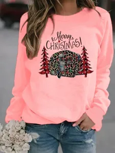 Close up detail of the pink Christmas sweatshirt featuring leopard camper graphic.