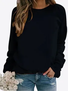 Close-up detail view of the casual black long-sleeve crewneck sweatshirt texture and cuff style.