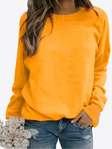 Women solid orange long sleeve crewneck sweatshirt casual pullover top for autumn daily wear.