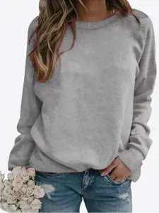 Casual grey crewneck long sleeve sweatshirt for women, perfect for autumn and winter daily wear.