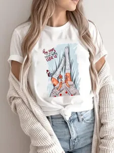 Casual women's white short sleeve t-shirt with Christmas graphic print and motivational quote.