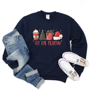 Christmas graphic crewneck sweatshirt detailed view featuring holiday print and long sleeves.