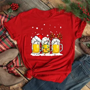 Close-up detail of the Christmas beer graphic on the red short sleeve T-shirt, festive vibe.