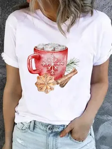 Close-up view of the watercolor Christmas mug graphic detail on the casual white t-shirt.