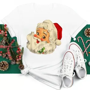Vintage Santa graphic detail on white short sleeve Christmas tee with festive holiday props.