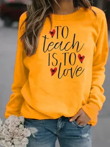 Nahaufnahme des gelben Freizeit-Sweatshirts mit stilvollem Lehrer-Druck und tollem Motiv.