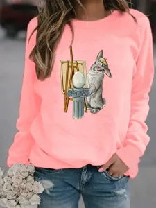 Pink graphic sweatshirt with cute rabbit painting, long sleeves, casual pullover design.