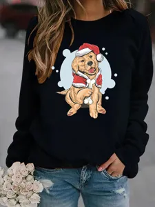 Close-up detail of the festive Christmas golden retriever graphic on the cozy black pullover.
