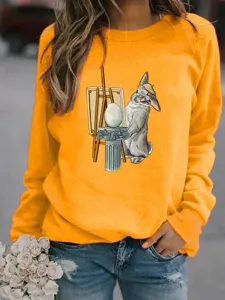 Orange fleece crewneck sweatshirt with cute artistic rabbit graphic print casual top.