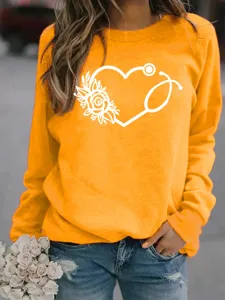 Oranger langärmliger Pullover mit einem hübschen medizinischen Stethoskop Blumen Herz.