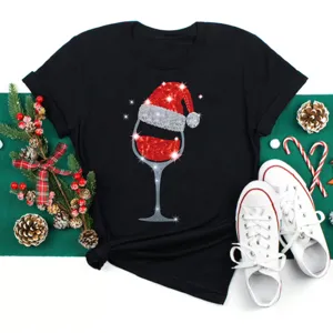 Details of the Christmas wine glass graphic black short sleeve T-shirt, festive holiday top.