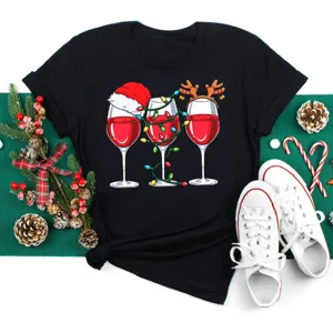 Christmas wine glass graphic short sleeve black t-shirt, festive holiday casual top for women.