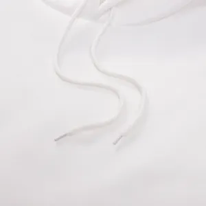 White hoodie drawstring detail close-up, minimalist plain sweatshirt fashion accessory view.