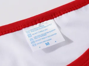 Dettaglio t-shirt girocollo modal neutra unisex che mostra le istruzioni di lavaggio.