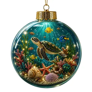 Magnifique boule de Noël en verre avec un monde sous-marin vibrant et des lumières.