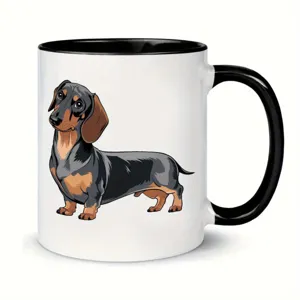 Close-up view of a ceramic coffee mug featuring a cute dachshund dog illustration design.
