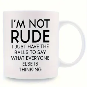 Detailed view of white ceramic coffee mug with funny novelty quote print text design.