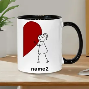 Tazza in ceramica personalizzabile con nome e cuore, regalo perfetto per coppie e innamorati.