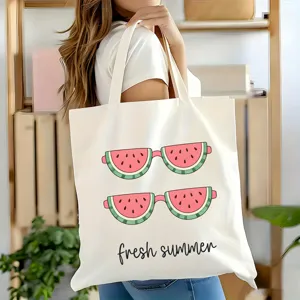 Vue détaillée du sac cabas en toile avec motif lunettes de soleil pastèque pour l'été.