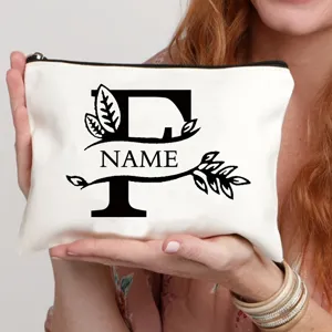Gepersonaliseerde canvas cosmetische tas met vintage letter F en bladontwerp, stijlvol en praktisch.
