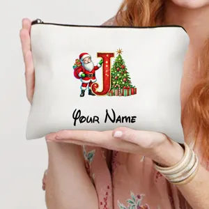 Nahaufnahme des personalisierten Weihnachtskosmetikbeutels mit Weihnachtsmann und J.