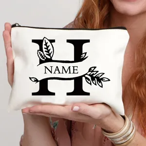Gepersonaliseerde canvas cosmetisch tasje met vintage letterontwerp, veelzijdige clutch.