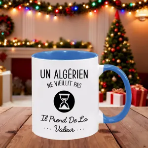 Detailed view of custom ceramic coffee mug with French text and hourglass design.
