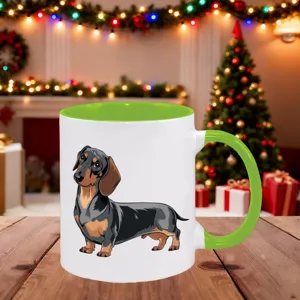 Ceramic coffee mug featuring cute dachshund design, green handle and rim, festive holiday decor.