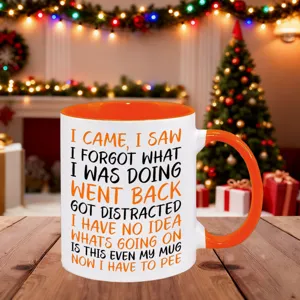 Funny novelty ceramic coffee mug with humorous quote text, perfect gift for daily use at home or office.