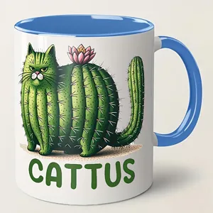 Ceramic coffee mug featuring a funny cactus cat design, blue handle, unique holiday gift.