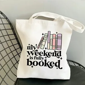 Sac cabas en toile blanc décontracté avec motif de livres et citation, sac d'épaule pratique.