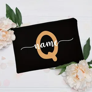 Customized letter Q floral canvas makeup pouch, elegant black cosmetic bag for daily use.
