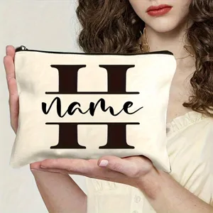 Canvas makeup bag with custom letter monogram design, portable zipper pouch for women.