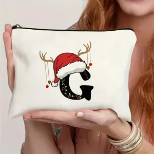 Nahaufnahme der weihnachtlichen Buchstaben-Leinwand-Tasche, festliches Design, Geschenk.