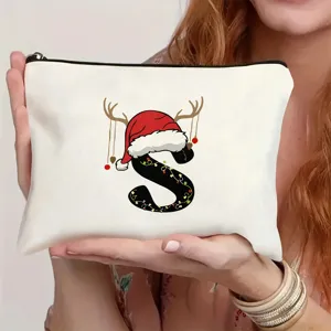 Nahaufnahme der Canvas-Kosmetiktasche mit festlichem Buchstaben S und Reißverschluss.