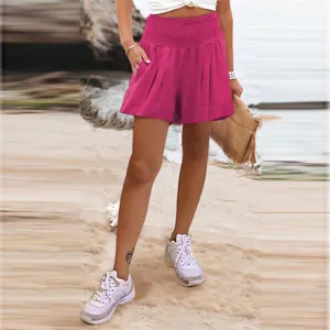 Short casual a vita alta e gamba larga in rosa vivo con comodo cinturino elastico arricciato.